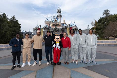 Michigan and Alabama football teams visit Disneyland ahead of Rose Bowl game